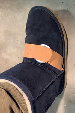 Magnet application over boot for foot soft tissue injury recovery